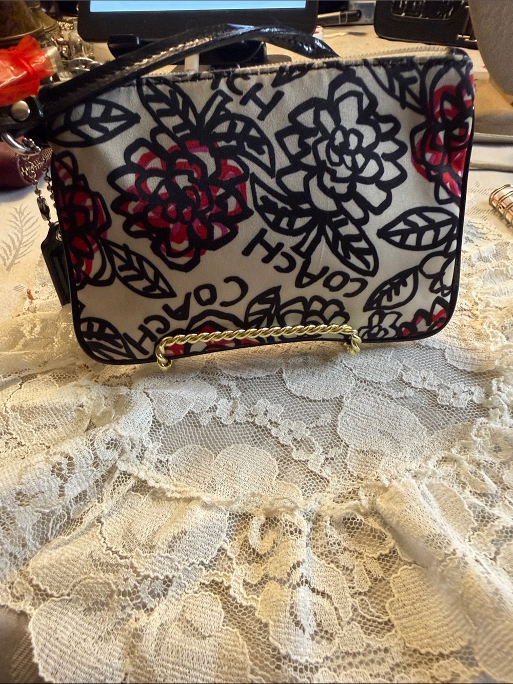 Coach Floral Canvas Wristlet in White, Black & Red